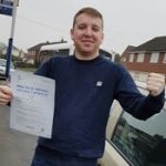 Brendan is pictured having passed his test